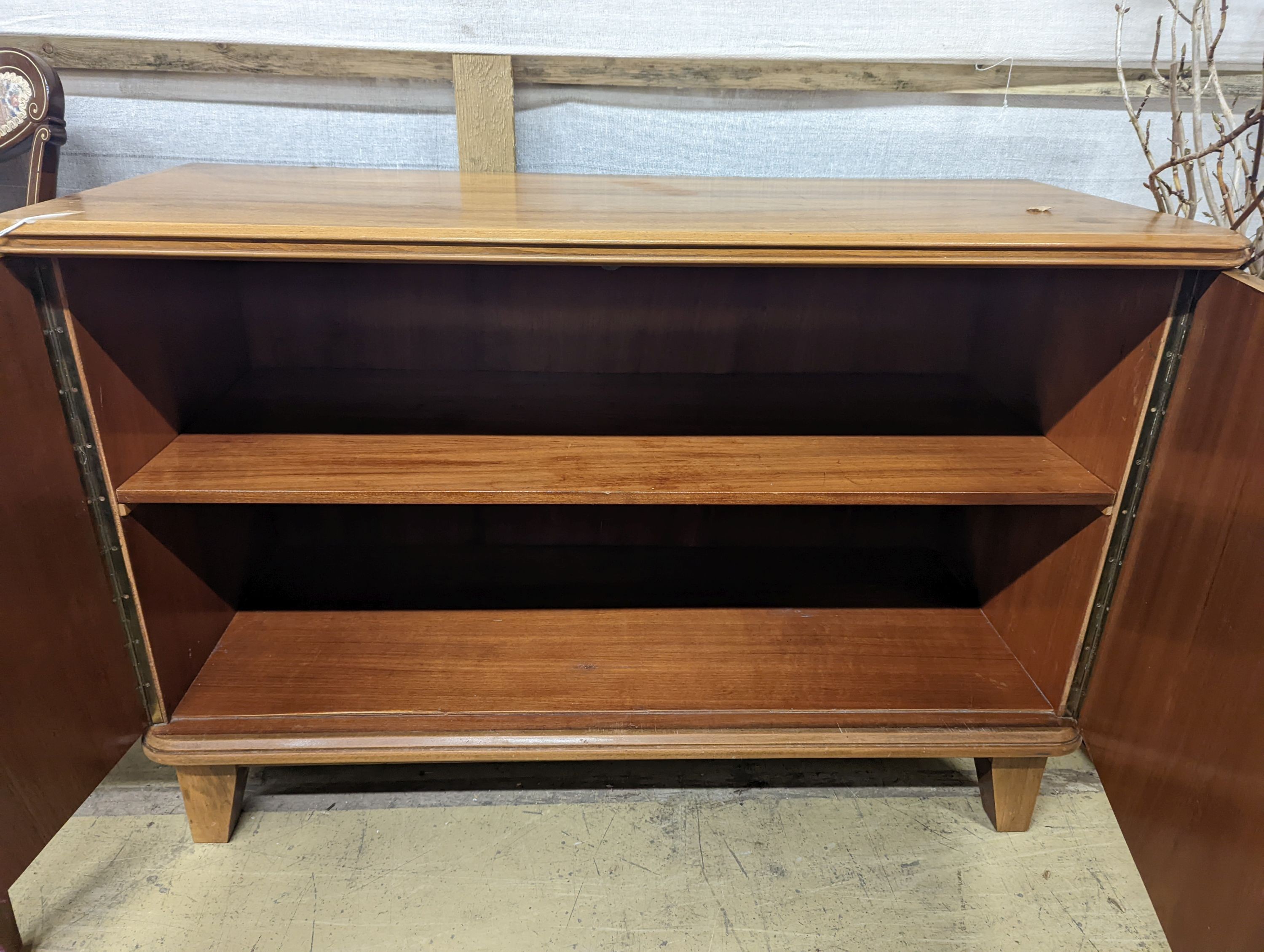 A Gordon Russell style walnut two door sideboard, width 116cm, depth 48cm, height 78cm